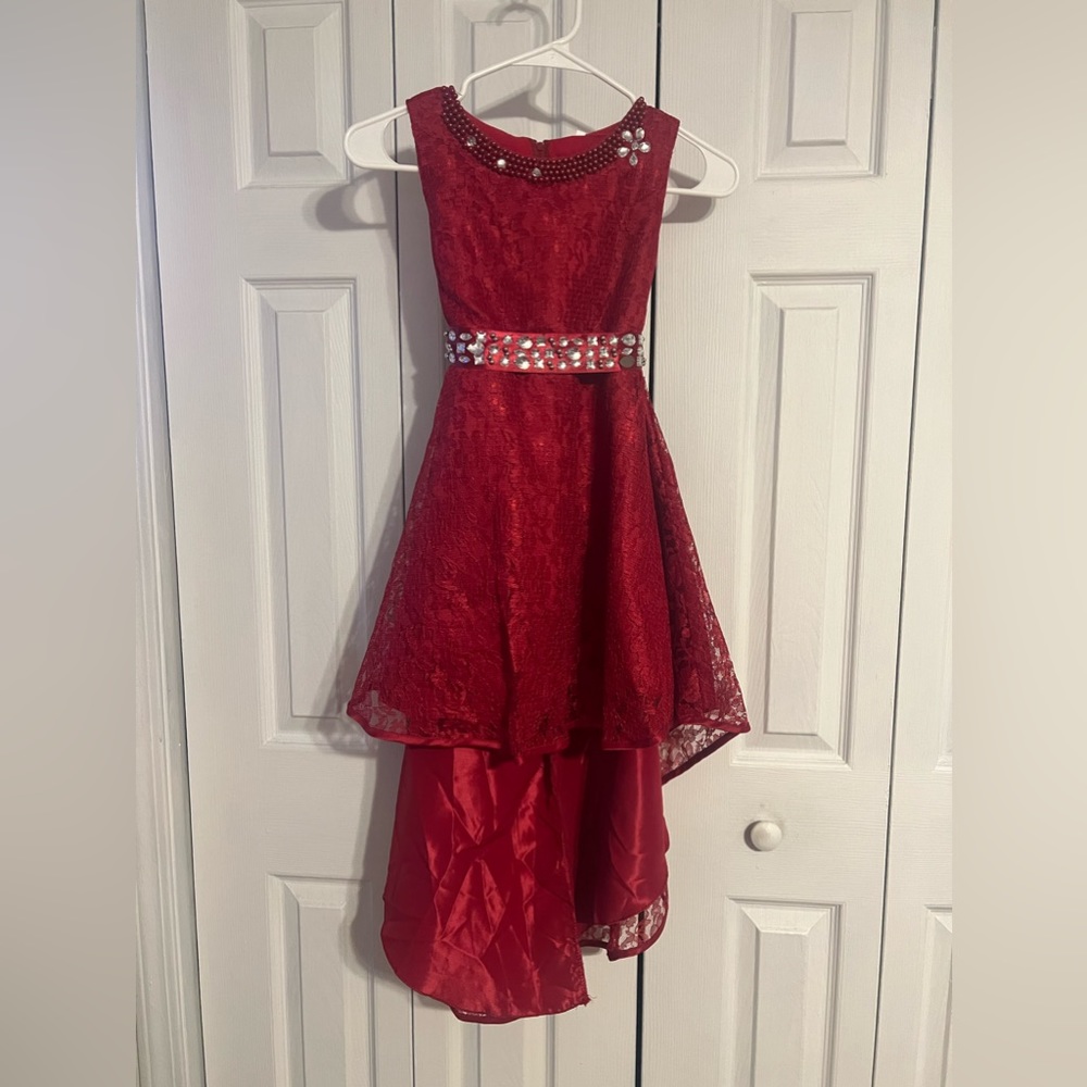 Beautiful high low children’s formal dress 
Never worn, size 12